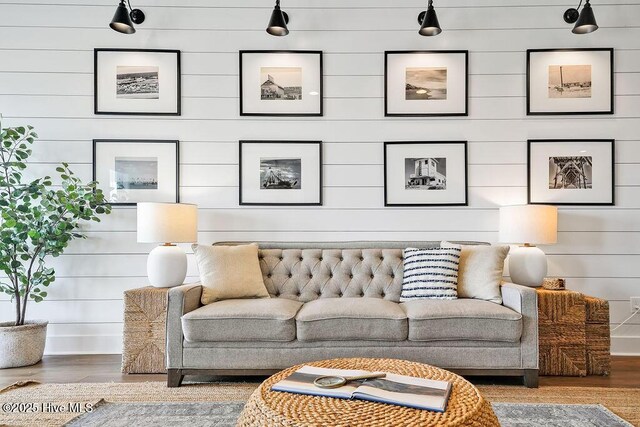 1753 New River Inlet Rd, North Topsail Beach, NC 28460 - living area featuring wood finished floors and wooden walls