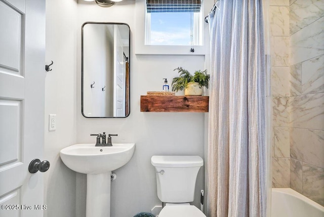 1753 New River Inlet Rd, North Topsail Beach, NC 28460 - bathroom with toilet and shower / bath combo with shower curtain