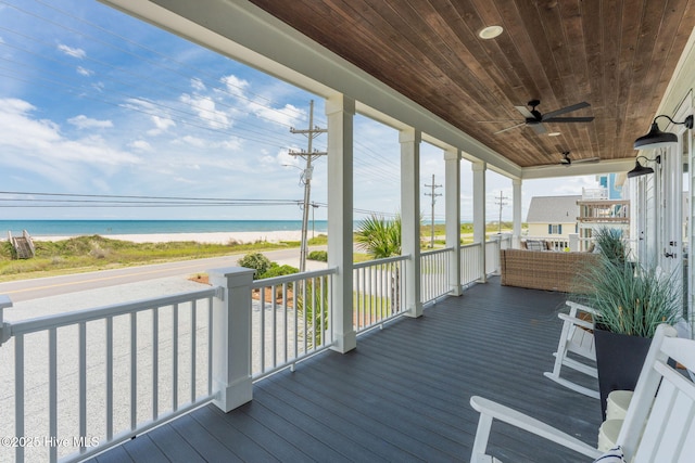 1753 New River Inlet Rd, North Topsail Beach, NC 28460 - wooden terrace featuring ceiling fan and view of water and beach