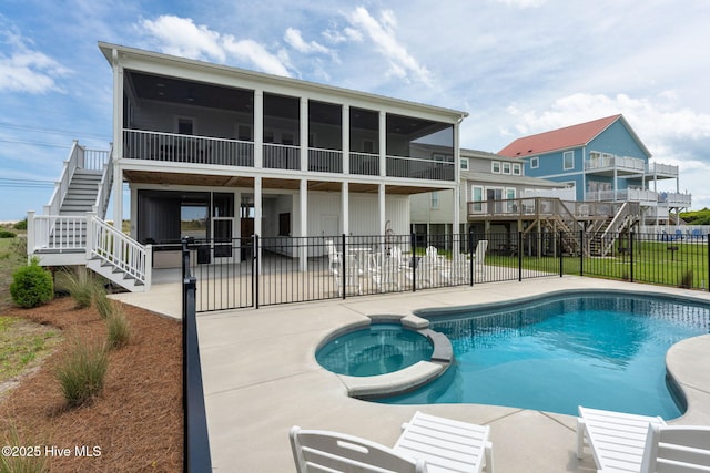 1753 New River Inlet Rd, North Topsail Beach, NC 28460 - view of pool with stairway, a sunroom, a patio, and a pool with connected hot tub