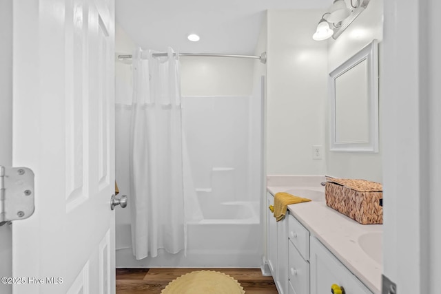 527 Everett Glades, Sneads Ferry, NC 28460 - full bathroom featuring vanity, wood finished floors, shower / bath combo, and recessed lighting