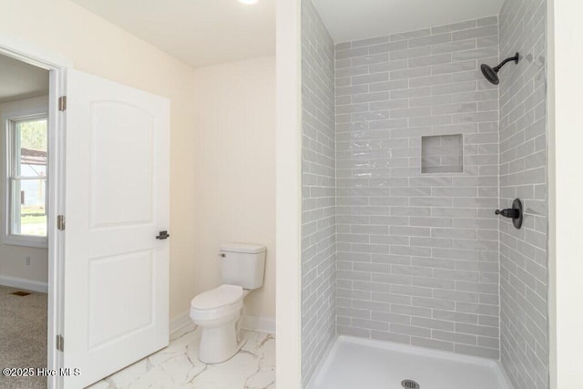 785 Daniels Rd, Corapeake, NC 27926 - full bathroom with a stall shower, toilet, baseboards, and marble look tiles
