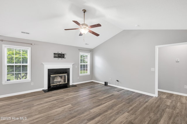 422 Point View Ct, Wilmington, NC 28411 - unfurnished living room with lofted ceiling, ceiling fan, a glass covered fireplace, wood finished floors, and baseboards
