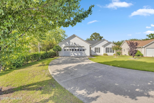422 Point View Ct, Wilmington, NC 28411 - ranch-style home with concrete driveway, a front yard, and a garage