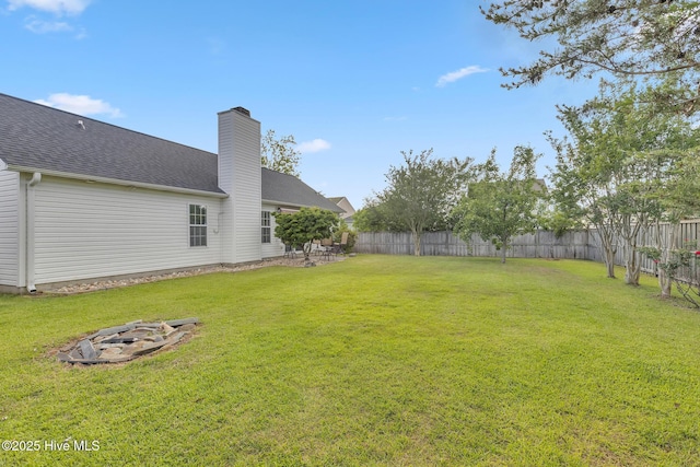 422 Point View Ct, Wilmington, NC 28411 - view of yard with an outdoor fire pit