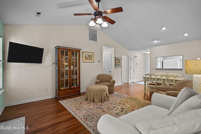 7100 Farrington Farms Dr, Wilmington, NC 28411 - living area with a ceiling fan, vaulted ceiling, wood finished floors, baseboards, and recessed lighting