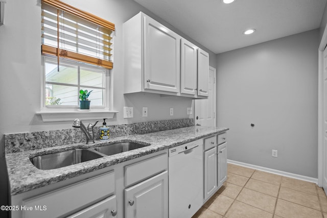 7100 Farrington Farms Dr, Wilmington, NC 28411 - kitchen featuring dishwasher, a sink, white cabinetry, recessed lighting, and light stone countertops