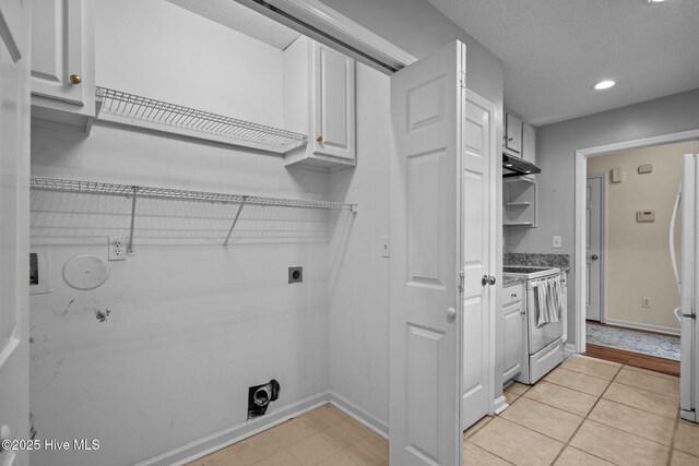 7100 Farrington Farms Dr, Wilmington, NC 28411 - washroom featuring electric dryer hookup, recessed lighting, baseboards, cabinet space, and gas dryer hookup
