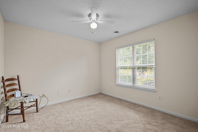 7100 Farrington Farms Dr, Wilmington, NC 28411 - unfurnished room with carpet, a ceiling fan, baseboards, and a textured ceiling