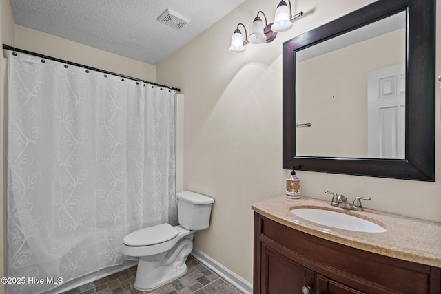 7100 Farrington Farms Dr, Wilmington, NC 28411 - bathroom with vanity, toilet, baseboards, a textured ceiling, and curtained shower