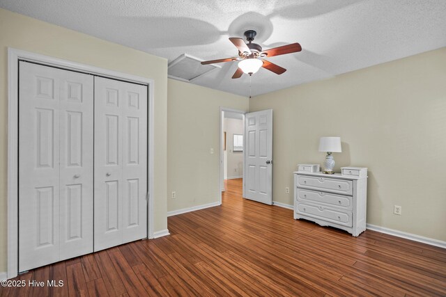 7100 Farrington Farms Dr, Wilmington, NC 28411 - unfurnished bedroom with wood finished floors, a closet, baseboards, and ceiling fan