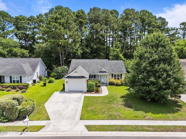 7100 Farrington Farms Dr, Wilmington, NC 28411 - view of front of house featuring a garage, concrete driveway, a front yard, and view of wooded area