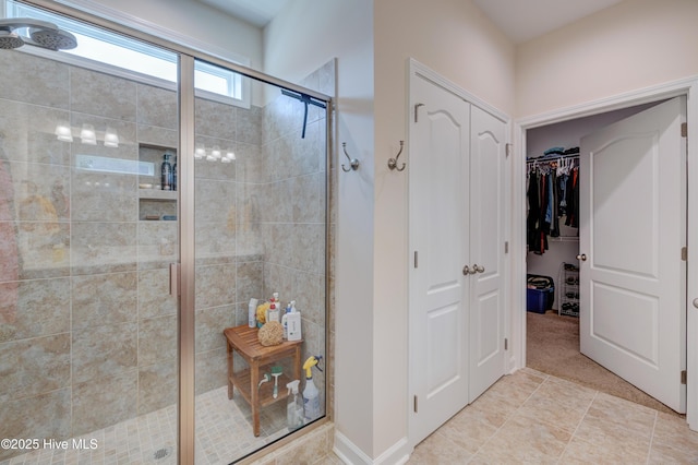 14 Thrush Trl, Hampstead, NC 28443 - full bathroom with a shower stall and a walk in closet