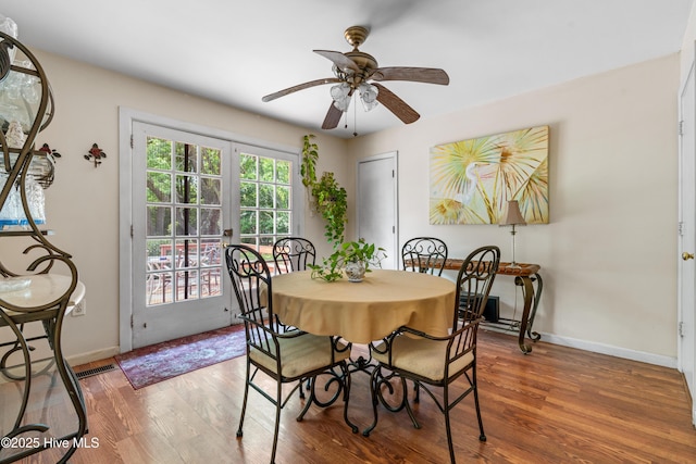 525 Mohican Trl, Wilmington, NC 28409 - dining space featuring ceiling fan, baseboards, and wood finished floors