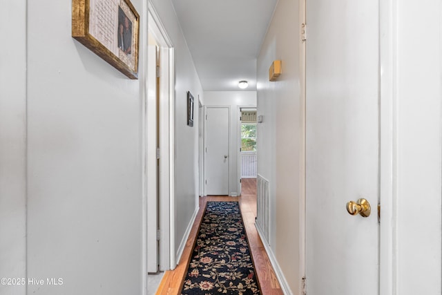 525 Mohican Trl, Wilmington, NC 28409 - corridor with baseboards and light wood-style floors