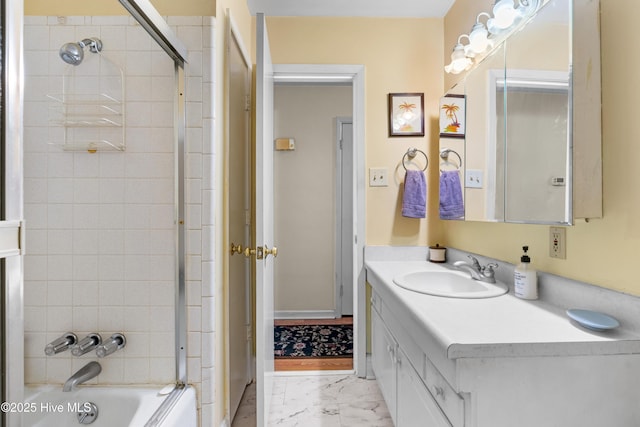 525 Mohican Trl, Wilmington, NC 28409 - bathroom featuring marble finish flooring, vanity, shower / bath combination, and baseboards