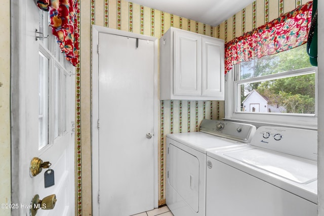 525 Mohican Trl, Wilmington, NC 28409 - washroom featuring wallpapered walls, independent washer and dryer, and cabinet space