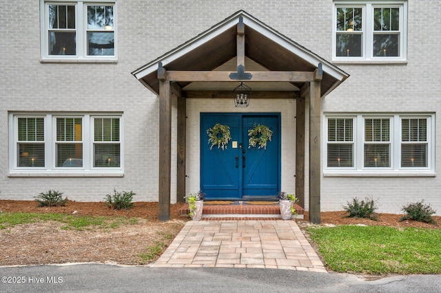 3504 Sheffield Dr, Rocky Mount, NC 27803 - view of exterior entry featuring brick siding