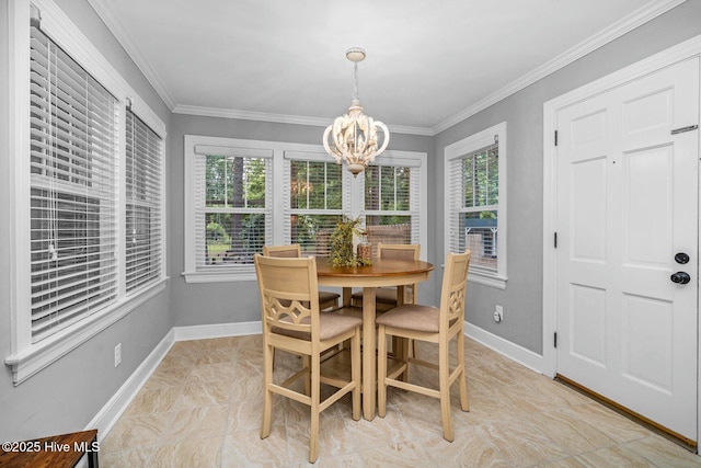 3504 Sheffield Dr, Rocky Mount, NC 27803 - dining room featuring a chandelier, plenty of natural light, baseboards, and ornamental molding
