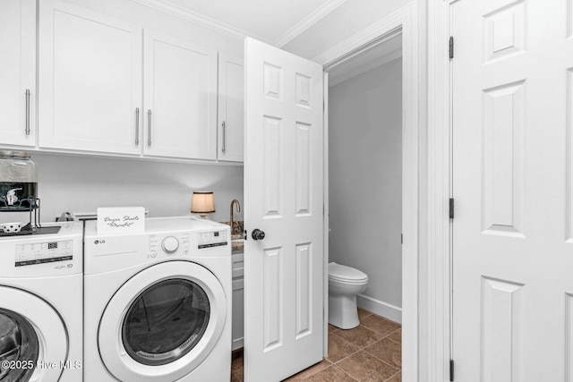 3504 Sheffield Dr, Rocky Mount, NC 27803 - laundry room featuring washer and dryer, crown molding, cabinet space, and tile patterned flooring