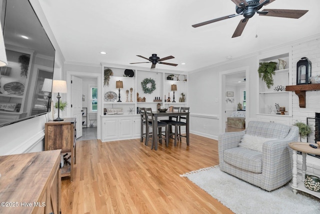 3504 Sheffield Dr, Rocky Mount, NC 27803 - living room featuring ceiling fan, light wood-type flooring, crown molding, built in features, and recessed lighting