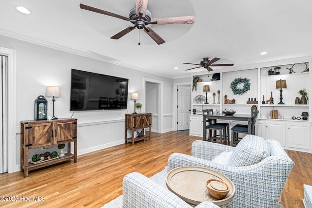 3504 Sheffield Dr, Rocky Mount, NC 27803 - living room with a ceiling fan, crown molding, light wood-style flooring, and recessed lighting