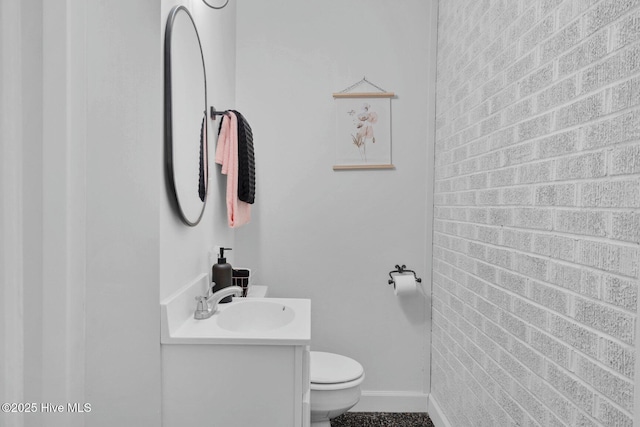 3504 Sheffield Dr, Rocky Mount, NC 27803 - half bathroom with vanity, toilet, and baseboards