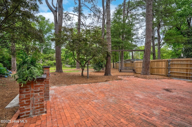 3504 Sheffield Dr, Rocky Mount, NC 27803 - view of patio / terrace with a gate and view of wooded area