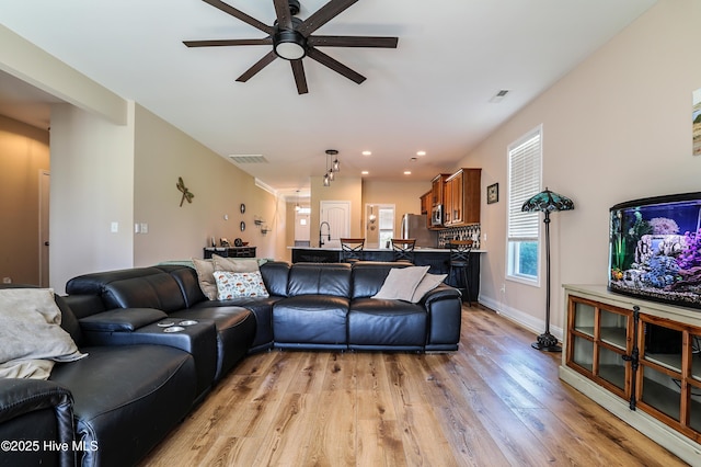1187 S Brook Rd, Winnabow, NC 28479 - living area featuring ceiling fan, light wood-style floors, and recessed lighting