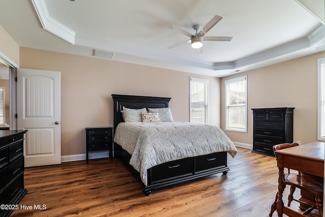 1187 S Brook Rd, Winnabow, NC 28479 - bedroom featuring a raised ceiling, crown molding, hardwood / wood-style floors, and ceiling fan