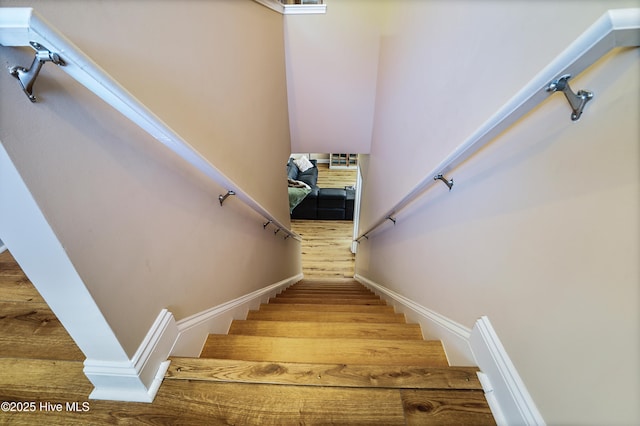 1187 S Brook Rd, Winnabow, NC 28479 - staircase featuring wood finished floors and baseboards