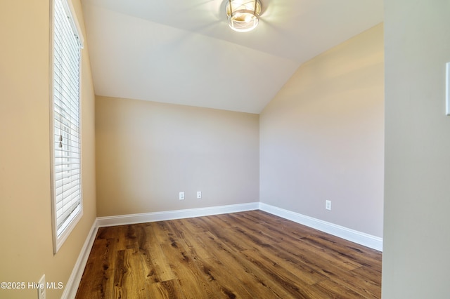 1187 S Brook Rd, Winnabow, NC 28479 - empty room featuring wood finished floors and vaulted ceiling