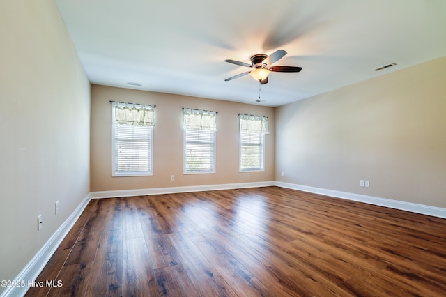 1187 S Brook Rd, Winnabow, NC 28479 - spare room with wood finished floors and a ceiling fan