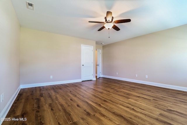 1187 S Brook Rd, Winnabow, NC 28479 - empty room featuring dark wood-style flooring and a ceiling fan