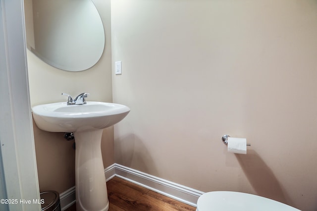 1187 S Brook Rd, Winnabow, NC 28479 - half bath with wood finished floors and toilet