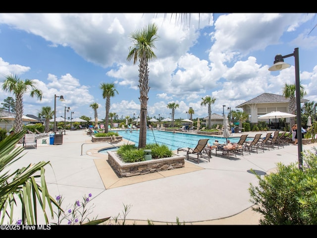 2385 Red Birch Trl NE, Leland, NC 28451 - community pool with a patio area