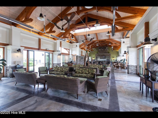 2385 Red Birch Trl NE, Leland, NC 28451 - living room featuring high vaulted ceiling and wood ceiling with exposed beams