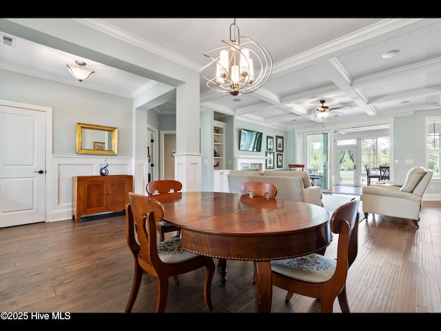 2385 Red Birch Trl NE, Leland, NC 28451 - dining space featuring ornamental molding, dark wood-style flooring, a chandelier, a ceiling fan, and beamed ceiling