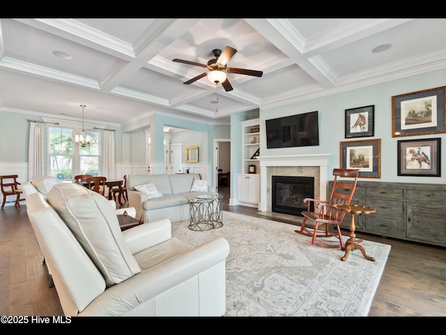 2385 Red Birch Trl NE, Leland, NC 28451 - living room with crown molding, beam ceiling, coffered ceiling, ceiling fan, and wood finished floors