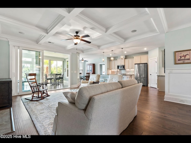 2385 Red Birch Trl NE, Leland, NC 28451 - living area featuring a ceiling fan, coffered ceiling, dark wood-type flooring, beam ceiling, and crown molding