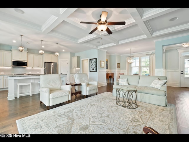 2385 Red Birch Trl NE, Leland, NC 28451 - living area featuring coffered ceiling, beam ceiling, ceiling fan, crown molding, and dark wood finished floors