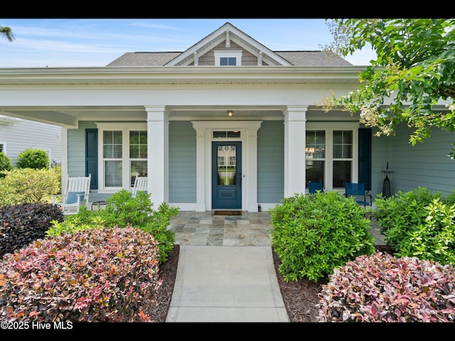 2385 Red Birch Trl NE, Leland, NC 28451 - property entrance with a porch and a shingled roof