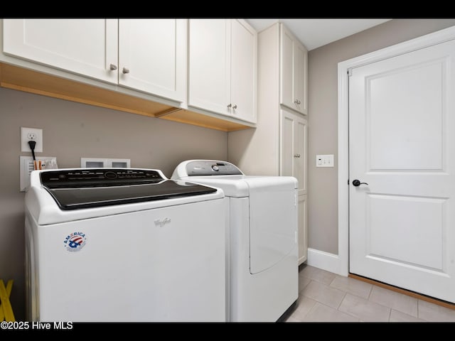 2385 Red Birch Trl NE, Leland, NC 28451 - washroom with separate washer and dryer, cabinet space, light tile patterned flooring, and baseboards