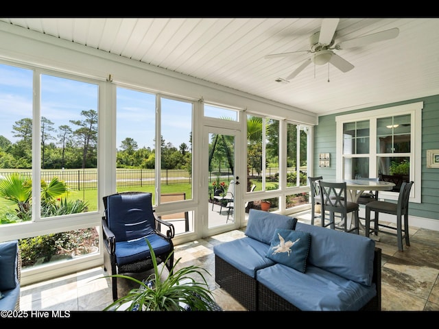 2385 Red Birch Trl NE, Leland, NC 28451 - sunroom with ceiling fan, an outdoor hangout area, and outdoor dining space
