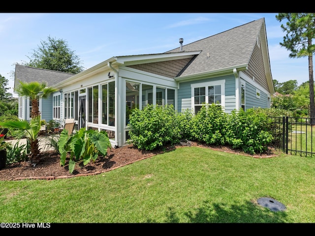 2385 Red Birch Trl NE, Leland, NC 28451 - back of house with a sunroom and a shingled roof