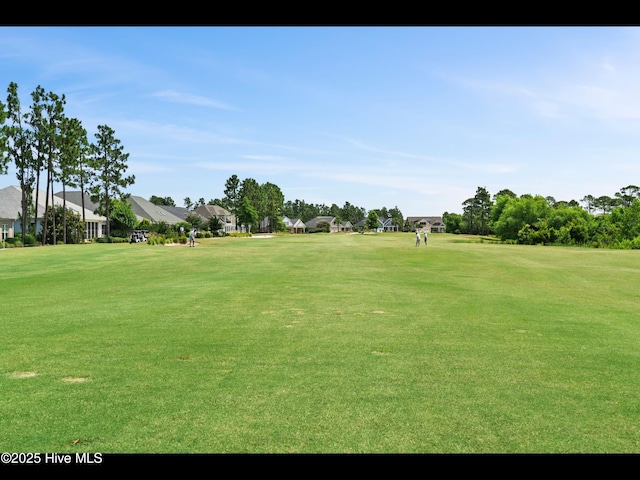 2385 Red Birch Trl NE, Leland, NC 28451 - view of property's community with a residential view, a lawn, and view of golf course