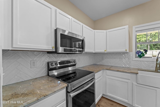 433 Shepherd Trl, Aberdeen, NC 28315 - kitchen featuring appliances with stainless steel finishes and white cabinets