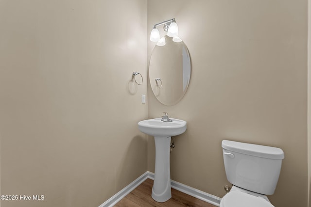 433 Shepherd Trl, Aberdeen, NC 28315 - bathroom featuring toilet and wood finished floors