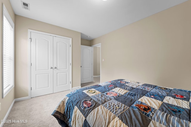 433 Shepherd Trl, Aberdeen, NC 28315 - carpeted bedroom with baseboards and a closet