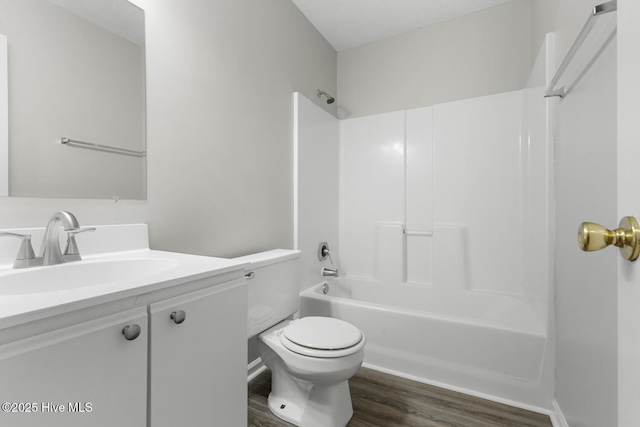 219 Live Oak Ct, Midway Park, NC 28544 - full bathroom featuring shower / bath combination, wood finished floors, toilet, and vanity